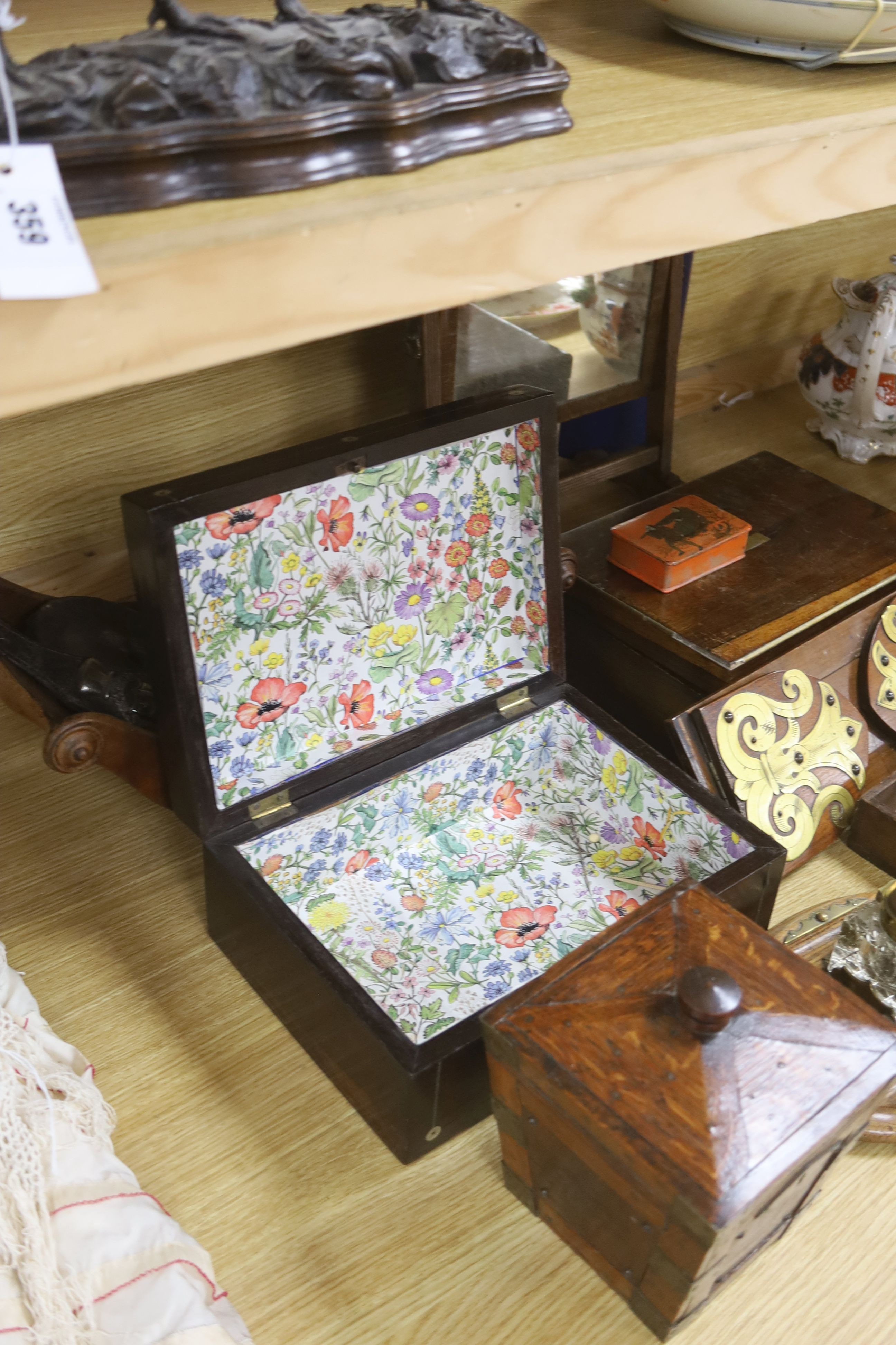 A Victorian mahogany cheese coaster, 40cm, an early 19th century toilet mirror, 29cm, an oak tea caddy, a book slide, an ink stand and sundry boxes